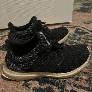 Black and turquoise adidas ultraboost parley edition